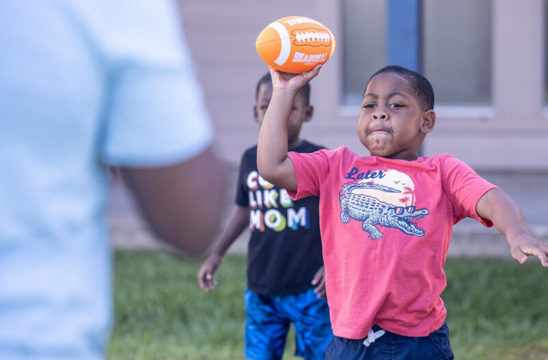 Patient Kainan Bowser playing football