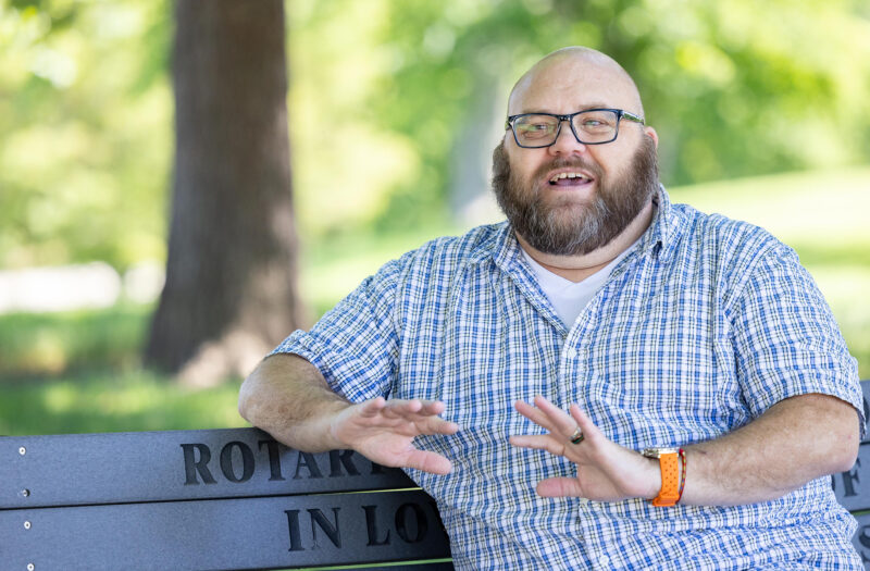 Jonathan Springborn sitting on a park bench.