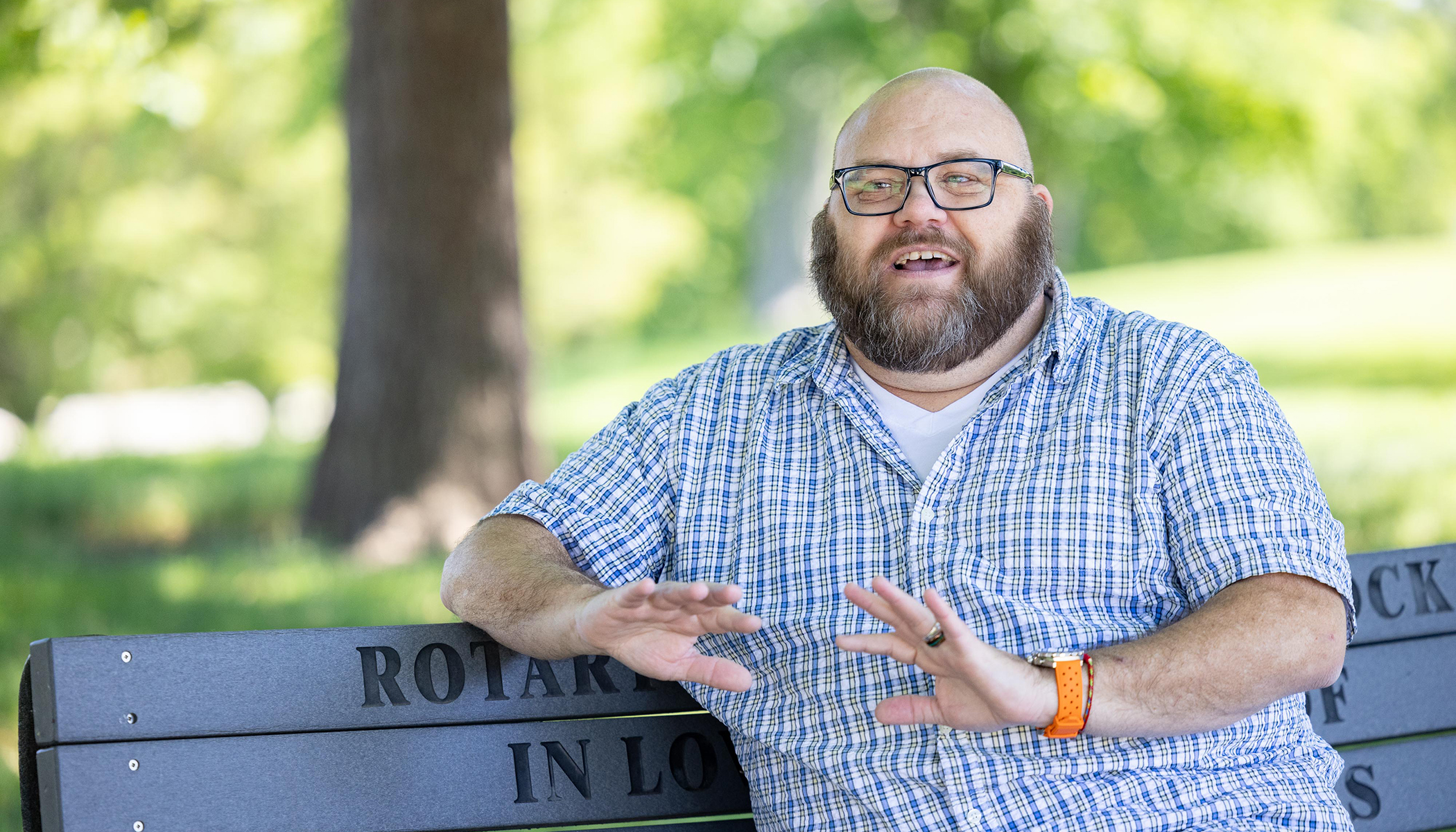 Jonathan Springborn sitting on a park bench.