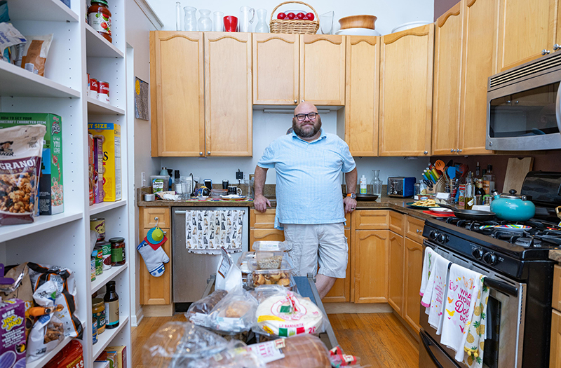 Jonathan Springborn standing in his kitchen.